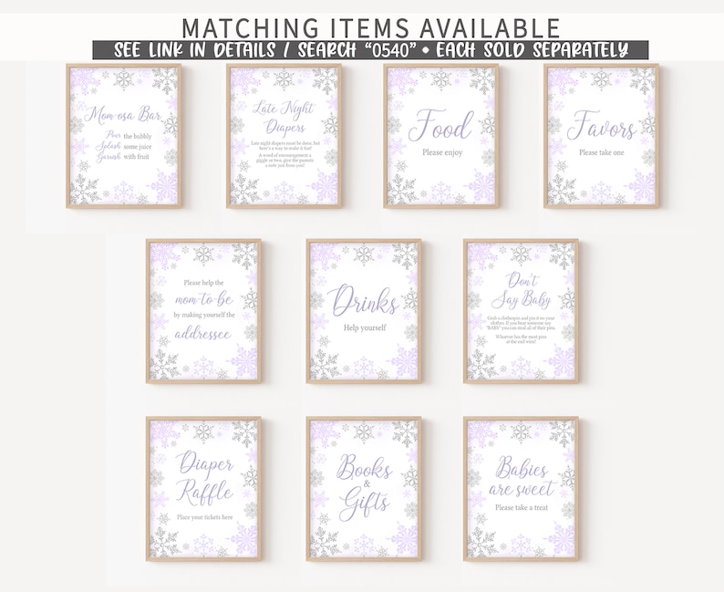 May include: A collection of framed signs with a winter theme. Each sign features a light purple background with silver and purple snowflake accents. Text on the signs includes "Mom osa Bar", "Food", "Favors", and "Babies are sweet".