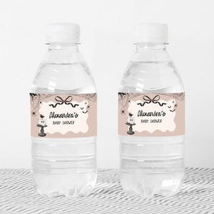 two bottles of water with labels on them