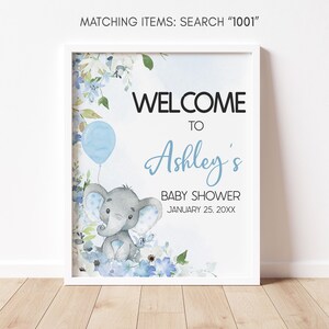 a picture of a baby shower sign with an elephant