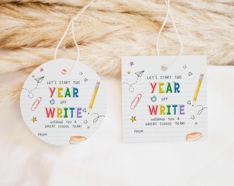 May include: Two white paper tags with the text "LET'S START THIS YEAR off WRITE" in colorful letters. One tag is round, the other square. Both tags have school-themed illustrations like pencils, paper airplanes, and stars.