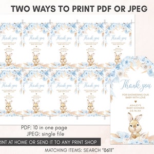 a set of two tags with a bunny on it