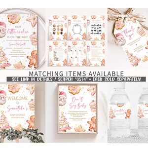 May include: A collection of baby shower stationery with a Christmas theme. Includes invitations, games, a welcome sign, and water bottle labels. Designs feature gingerbread men, Christmas trees, and Santa Claus in pink and gold.