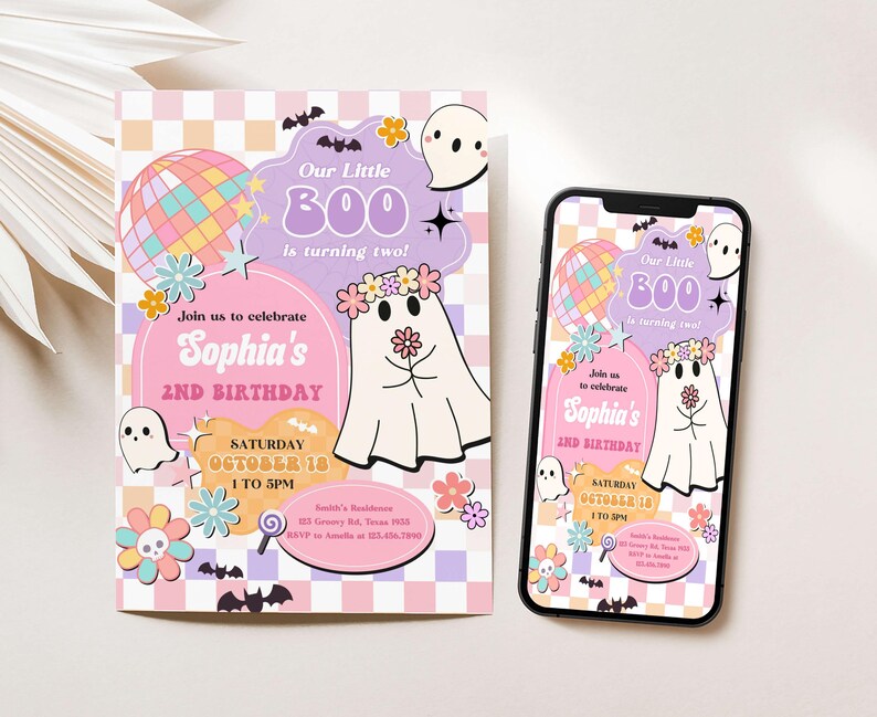 a cell phone next to a birthday card