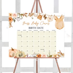 a calendar with clothes hanging on a clothes line