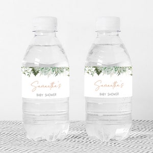a couple of water bottles sitting on top of a table