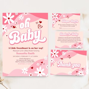 a baby shower party with pink and white flowers