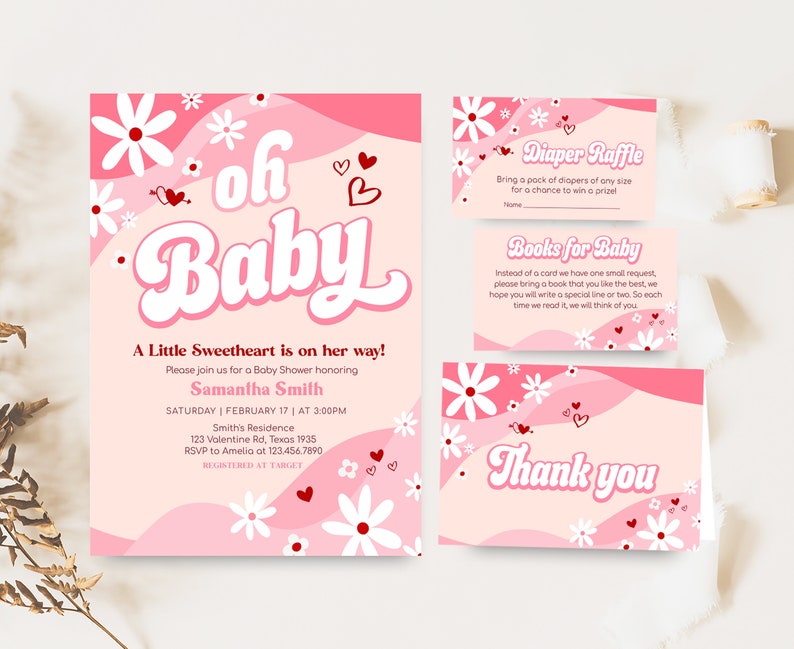a baby shower party with pink and white flowers