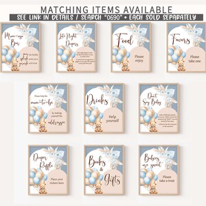 May include: Set of 10 printable baby shower signs with a blue and brown color scheme. The signs feature a teddy bear holding balloons and text such as "Mum-to-be Bar", "Late Night Diapers", "Food", "Favors", "Drinks", "Don't Say Baby", "Diaper Raffle", "Books & Gifts", and "Babies are Sweet".