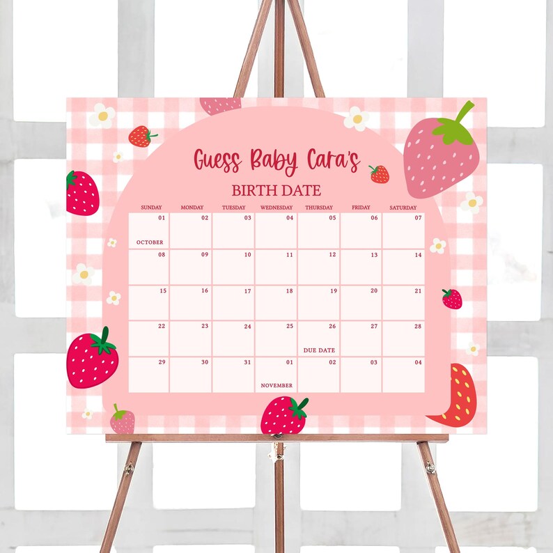 a pink and white calendar with strawberries on it