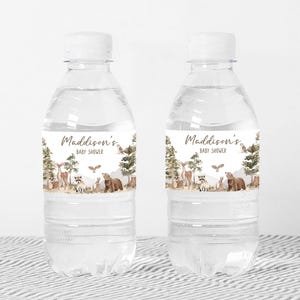 a bottle of water with a picture of animals on it