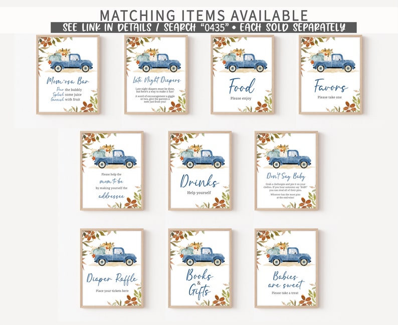 May include: A collection of framed signs with a watercolor illustration of a blue pickup truck carrying pumpkins. The signs have text for a baby shower, including "Momosa Bar," "Food," and "Favors." The signs are surrounded by floral accents.