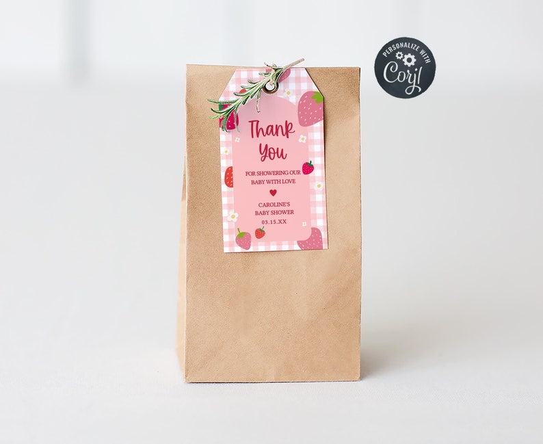 a brown paper bag with a thank you note attached to it