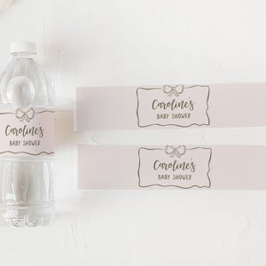 a bottle of water next to a pair of scissors