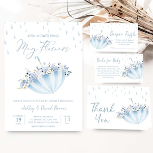 Puede incluir: Juego de invitaciones para baby shower con un diseño de paraguas azul claro lleno de flores azules y blancas. La invitación incluye detalles para el baby shower de Ashley & David Brown, con rifa de pañales, solicitud de libros y tarjetas de agradecimiento.