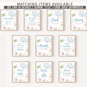 May include: A collection of framed signs with an ocean theme, featuring illustrations of whales, turtles, and jellyfish. The signs have text such as "Mom-osa Bar", "Food", and "Favors". The signs are in a light blue and beige color scheme.