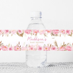 May include: Water bottle label with a pink floral design and the text "Madisson's Baby Shower".
