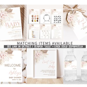 Puede incluir: Un conjunto de decoraciones imprimibles para una fiesta de bienvenida al beb&eacute; con tem&aacute;tica boho. Las decoraciones presentan una paleta de colores neutros con acentos rosados y hierba de la pampa. El conjunto incluye un cartel de bienvenida, un juego de "no digas beb&eacute;", etiquetas para botellas de agua y una etiqueta de agradecimiento.