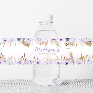 May include: Water bottle label with a floral design in shades of purple, brown, and white. The label says "Maddison's Baby Shower".