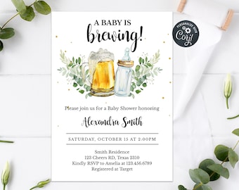 May include: A baby shower invitation with a watercolor illustration of a beer bottle and a baby bottle. The text reads "A baby is brewing!" and includes the name "Alexandra Smith", the date "Saturday, October 15 at 2:00 PM", and the location "Smith Residence, 123 Cheers RD, Texas 2310".