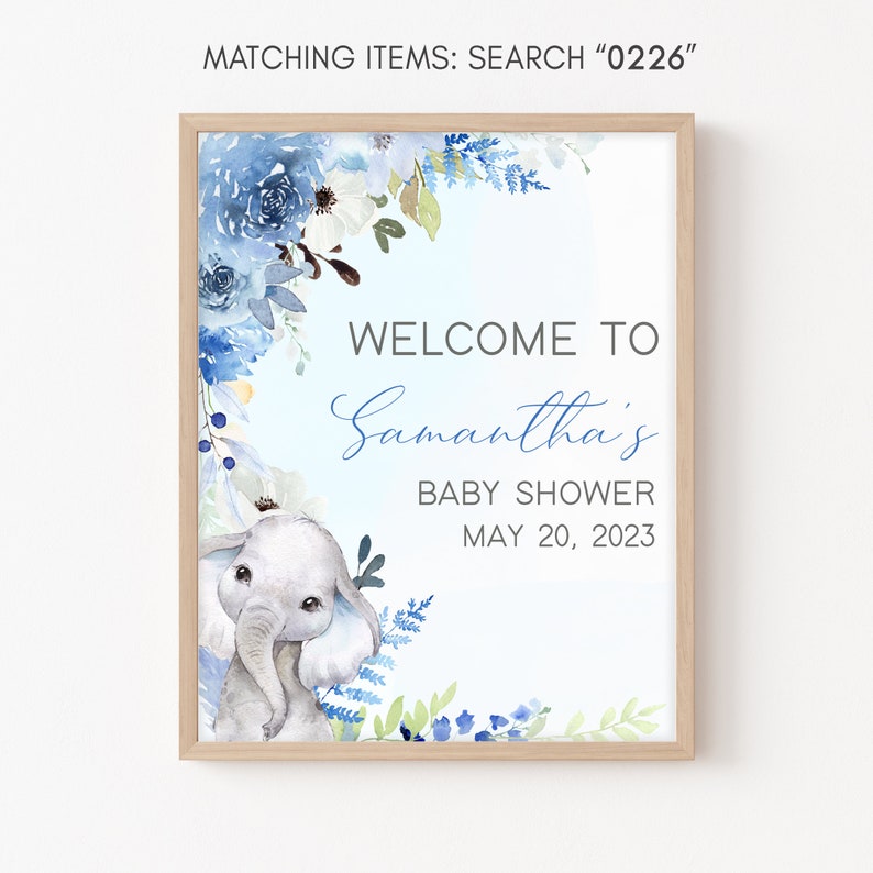 May include: A blue and white baby shower welcome sign featuring a watercolour floral design and a cute elephant illustration. The sign reads "Welcome to Samantha's Baby Shower May 20, 2023".