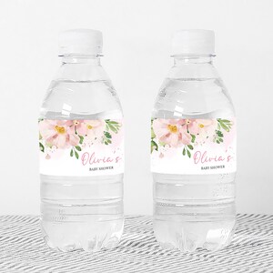 a couple of water bottles sitting on top of a table