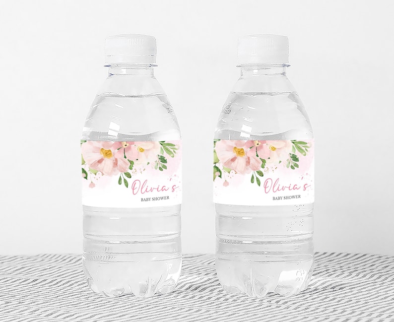 a couple of water bottles sitting on top of a table