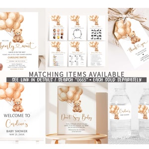 Op de afbeelding: Een set printbare babyborstdecoraties met een teddybeer die ballonnen vasthoudt. De decoraties omvatten een welkomstbord, een 'zeg niet baby'-bord, waterfleslabels en een bedankkaart. Het thema is bruin en goud.