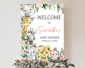 May include: Welcome to Samantha's Baby Shower sign with a watercolor illustration of a giraffe, zebra, elephant, rhino, lion, and monkey surrounded by pink and green flowers.