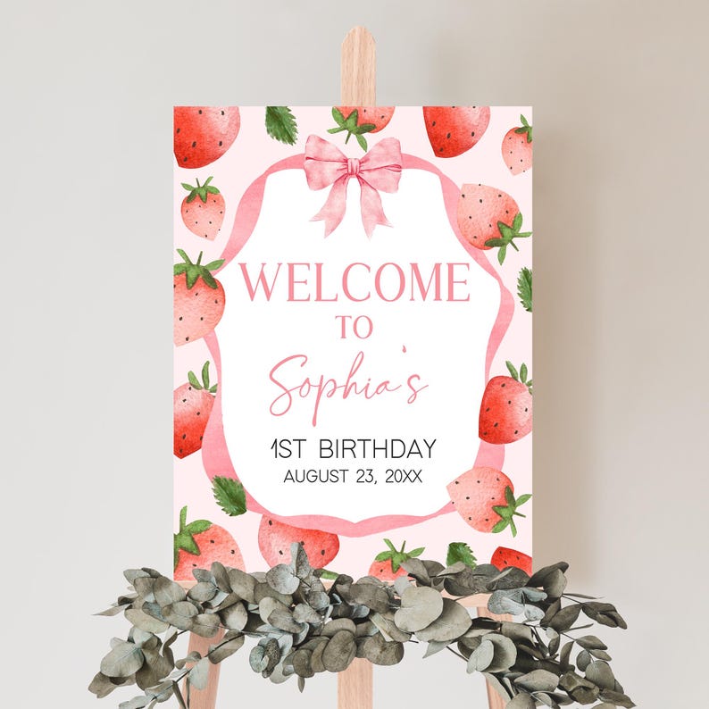 a welcome sign with strawberries on it