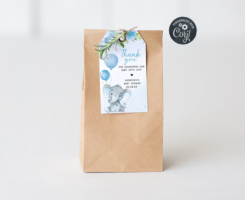 May include: A blue and gray thank you tag with an elephant holding balloons. The tag says "Thank you for showering our baby with love" and includes the date "03.18.23".