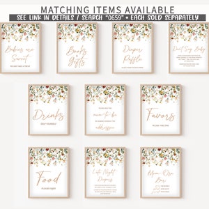 May include: Set of ten printable signs for a baby shower with floral borders and gold calligraphy. The signs include "Babies are Sweet", "Books & Gifts", "Diaper Raffle", "Don't Say Baby", "Drinks", "Please Help the Mom-to-be", "Favors", "Food", "Late Night Diapers", and "Mom-osa Bar".