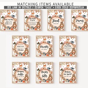 May include: A collection of framed signs with woodland animal illustrations and text. The signs include phrases like "Mom-osa Bar," "Food," and "Favors." The signs have a fall theme with brown, orange, and green colors.