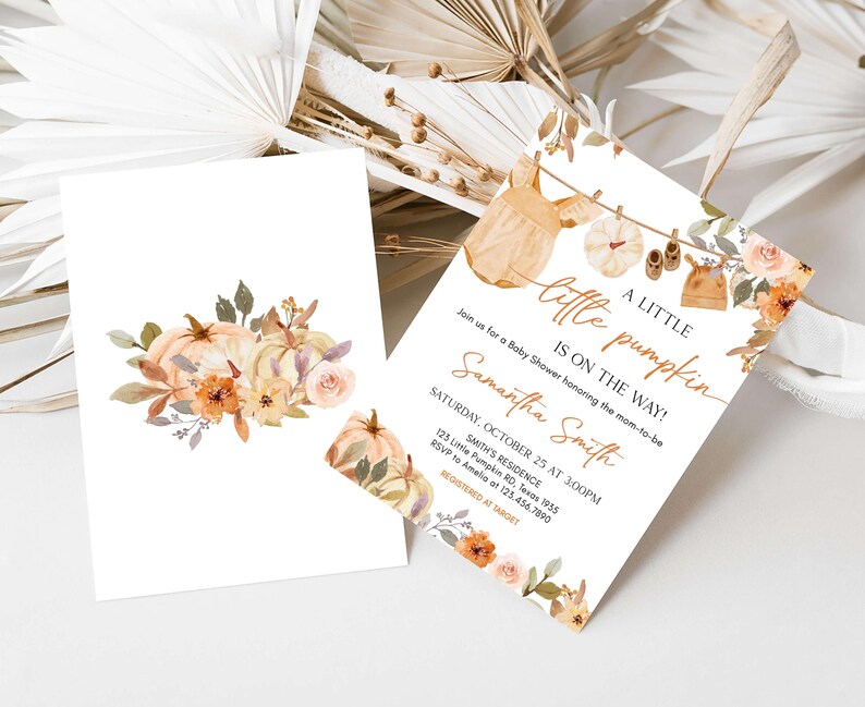 a wedding card with a floral design on it