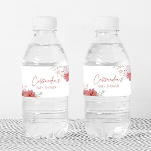 a couple of water bottles sitting on top of a table