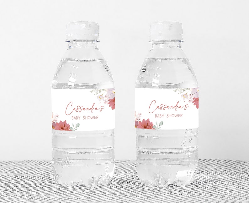 a couple of water bottles sitting on top of a table