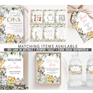 May include: A set of printable baby shower decorations featuring a jungle theme with a pink and green color scheme. The set includes a welcome sign, a don't say baby sign, a thank you tag, and a water bottle label. The design features a variety of jungle animals, including a lion, giraffe, monkey, and zebra.