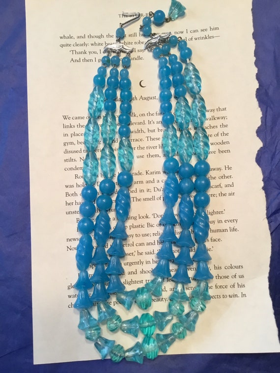 Multi strand vintage plastic blue beaded necklace