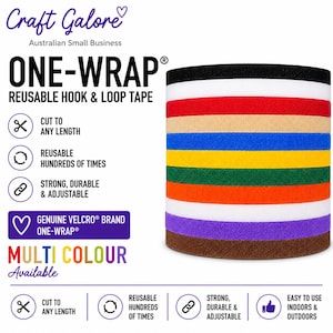 May include: A stack of multi-coloured One-Wrap reusable hook and loop tape strips in black, white, red, beige, blue, yellow, green, orange, purple, and brown. The image includes text detailing features like cut to any length and reusable.