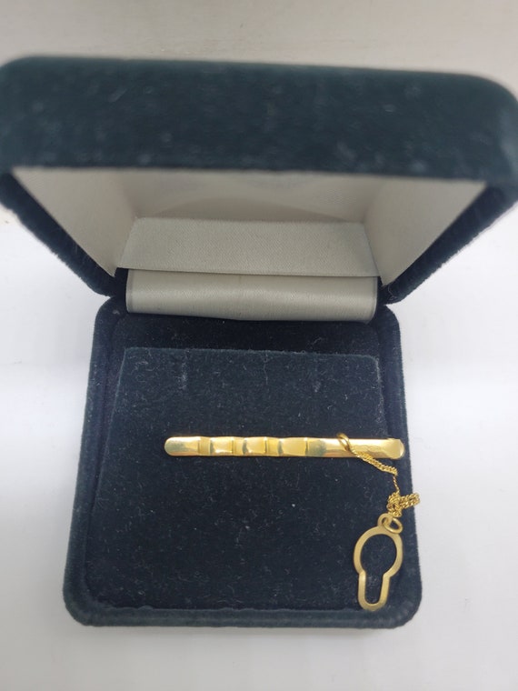 18k yellow gold tie clip with diamond