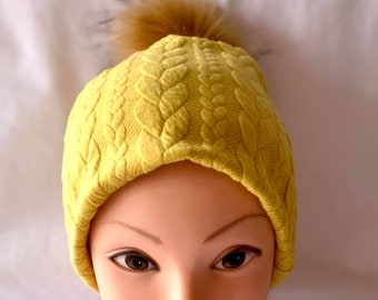 tuque/beanie/women's winter hat in twisted jersey fully lined, mustard color, removable blond pompom in faux fur