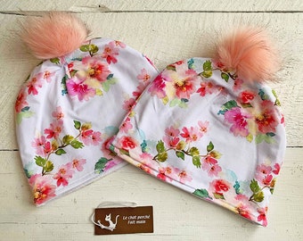 tuque/beanie/bonnet winter jersey cotton lined in polar soft flowers pink background white pompom interchangeable in faux fur pink