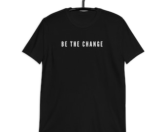 Be the Change Schwarzes Kurzarm Unisex T-Shirt,