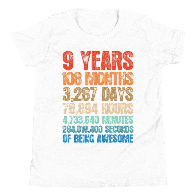 May include: White t-shirt with a colorful graphic that reads "9 Years 108 Months 3,287 Days 78,894 Hours 4,733,640 Minutes 284,018,400 Seconds of Being Awesome".