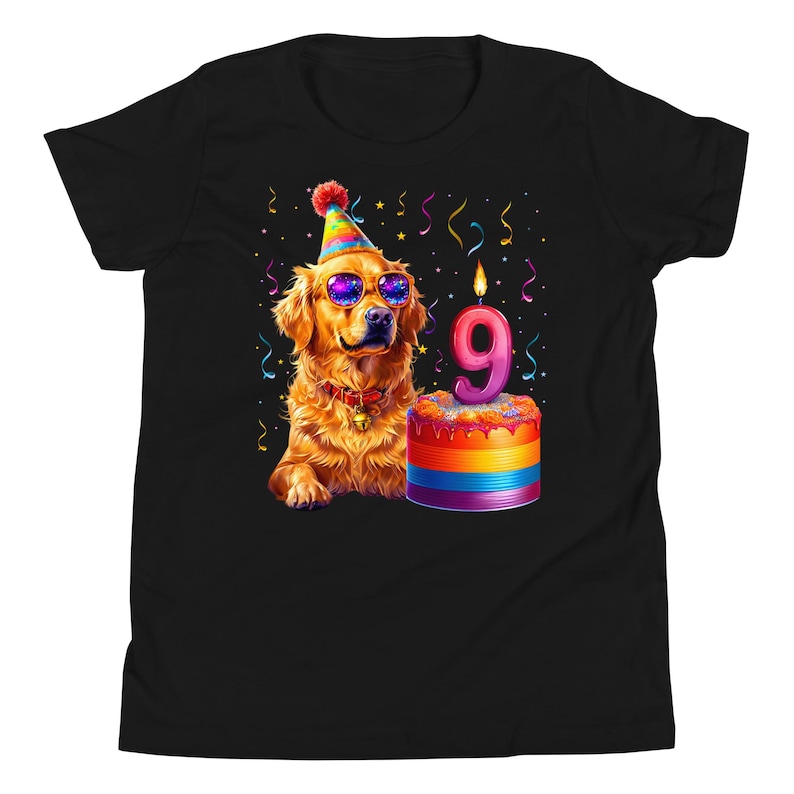 May include: Black t-shirt featuring a golden retriever wearing sunglasses and a party hat. A colorful birthday cake with a number 9 candle is next to the dog. Confetti and streamers are in the background.
