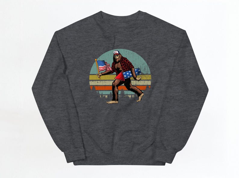 Bigfoot Patriotic Sweatshirt, Bigfoot 4th of July Sweatshirt, Bigfoot Holding American Flag Sweater, Bigfoot USA Lover Gift