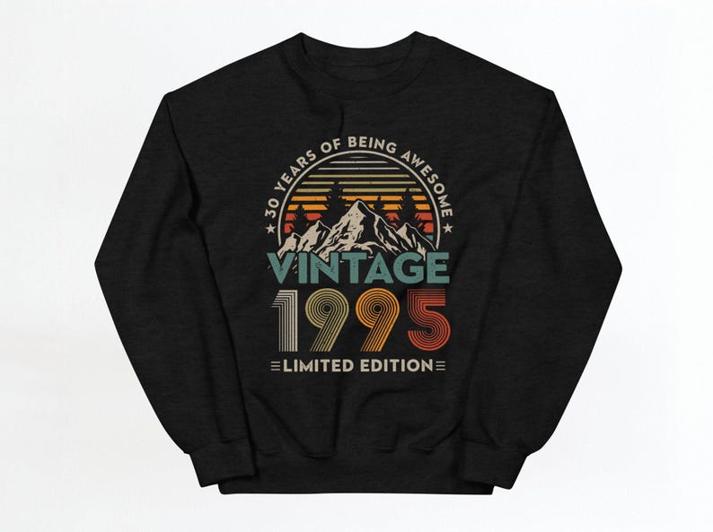 May include: Black sweatshirt with a vintage 1995 design. The text reads "30 Years of Being Awesome Vintage 1995 Limited Edition" with a mountain range and sunset graphic.