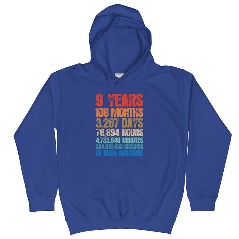 May include: A royal blue hooded sweatshirt with a vintage-style graphic that reads "9 Years 108 Months 3,287 Days 78,894 Hours 4,733,640 Minutes 284,018,400 Seconds of Being Awesome".