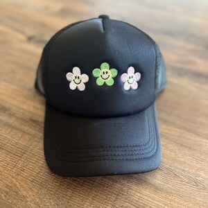 Smiley face flower foam trucker hat, embroidered smiley face hat, puff foam trucker hat, smiley face, flowers, smiley face hat, adult hat