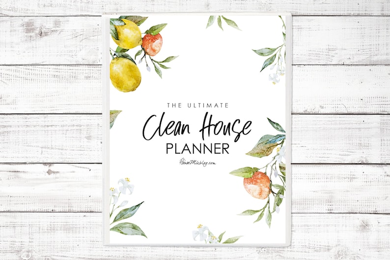 May include: A white printable planner with the text "The Ultimate Clean House Planner" and a watercolor border of lemons, oranges, and white flowers.