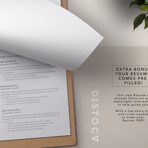 May include: A close-up of a resume template with the text "EXTRA BONUS YOUR RESUME COMES PRE FILLED!" and "Your new Resume is already filled out with meaningful information to help guide you. With a few extra tips and tricks needed to make your Resume POP!"